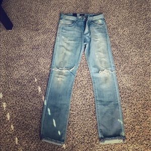 New, light denim, distressed jeans